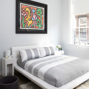 Modelo de dormitorio minimalista con paredes grises