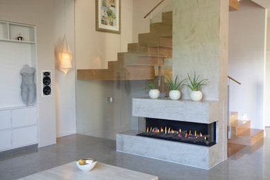 This is an example of a contemporary living room in Denver with white walls, ceramic floors, a ribbon fireplace and a stone fireplace surround.