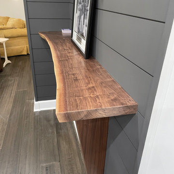 Basement launch and bar buildout with custom furniture