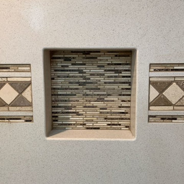 Recessed wall niche with decorative tile accent