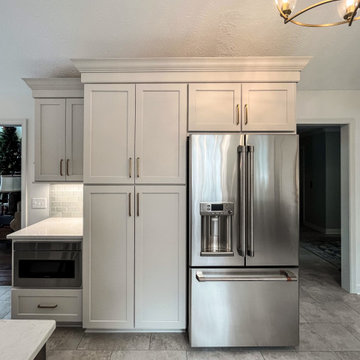 Two Tone Kitchen with Wood Stained and Light Beige Cabinets