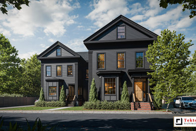 Example of a large classic black wood and clapboard exterior home design in Boston with a shingle roof and a gray roof