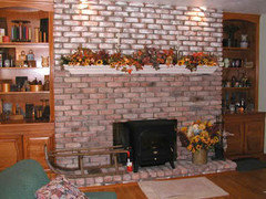 brick and plaster fireplace