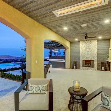 Underneath Main Patio Cover with view of Custom Fireplace Design by Custom Outdo