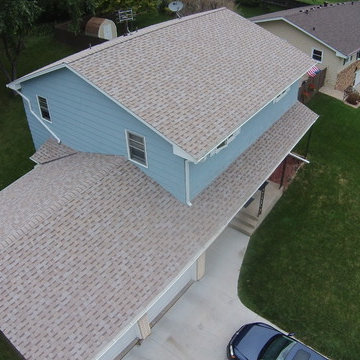 New Owens Corning "Amber" color asphalt shingle roof.