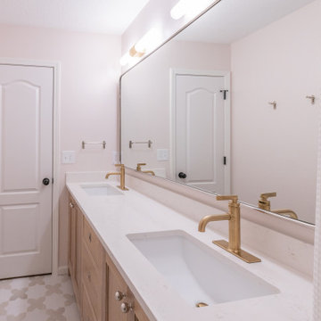 Playful Guest Bath Remodel with Fun Tile and Mixed Metals