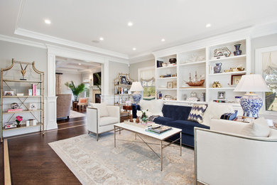 Inspiration for a large transitional formal and open concept dark wood floor living room remodel in New York with gray walls and no tv