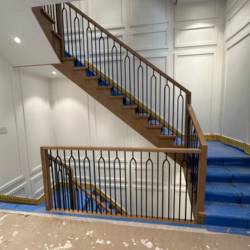 Custom Wood Staircase with Decorative Metal Balusters