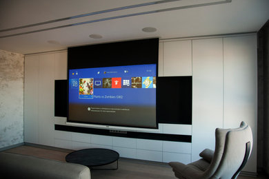 Design ideas for a home theatre in Saint Petersburg with a projector screen.