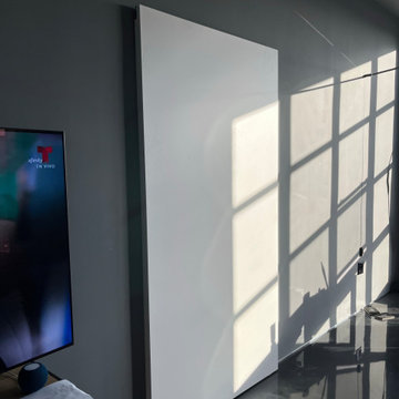 Premium Secret & Sliding Barausse doors, Vives Concrete look tiles and Kohler