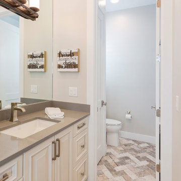 Elegant Double Vanity with Custom Cabinetry and Contemporary Touches