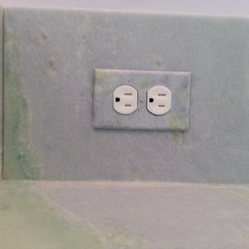 custom hand painted plug cover on backsplash in Richmond, Va