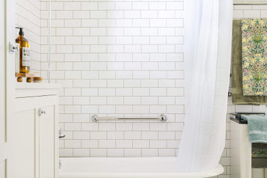 Mid-sized arts and crafts 3/4 white tile and ceramic tile ceramic tile, blue floor and single-sink bathroom photo in Portland with shaker cabinets, white cabinets, a one-piece toilet, yellow walls, a pedestal sink, white countertops and a freestanding vanity