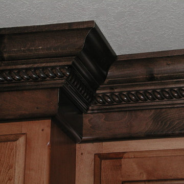 Maple Stained Cabinets With a Darker Crown Molding