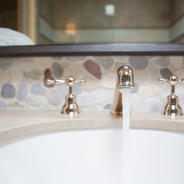 Transitional Bath with River Rock Accents