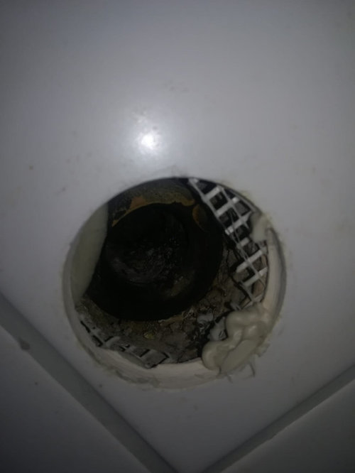 What are these holes on bathroom wall?