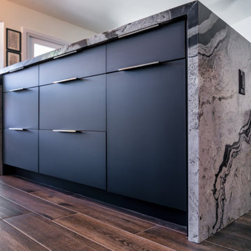 Matte Ivory Kitchen Remodel with Leathered Granite in Ahwautukee, AZ