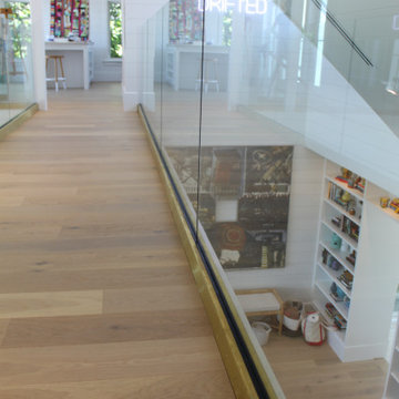 Glass Balustrade with Aluminum Base Rail Finished with Satin Brass Cladding