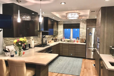 Inspiration for a mid-sized modern l-shaped light wood floor and beige floor eat-in kitchen remodel in Philadelphia with an undermount sink, flat-panel cabinets, brown cabinets, granite countertops, stone slab backsplash, stainless steel appliances, an island, beige countertops and multicolored backsplash