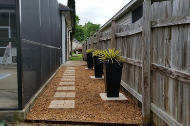 Inspiration for a small traditional side yard mulch landscaping in Atlanta.