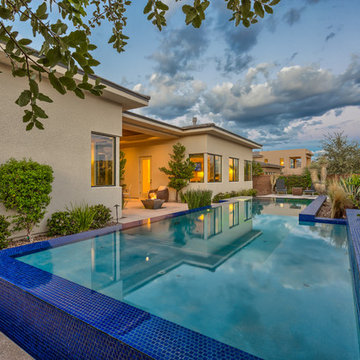 Raised Rim Flow Pool with Custom Fire/Water Feature