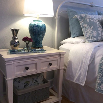 Serene blue, gold and silver master bedroom