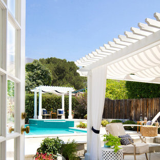 Inspiration for a traditional patio in Los Angeles with a pergola.