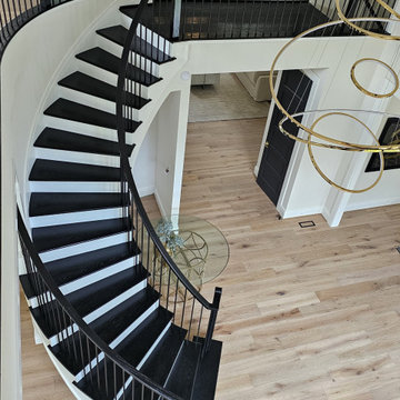 Project #130 | Curved Staircase with Wraparound Balcony