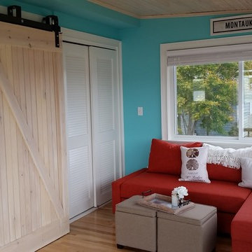 Sun room with sliding barn doors