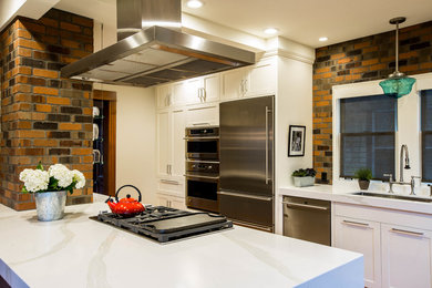 Example of a mid-sized urban kitchen design in Seattle