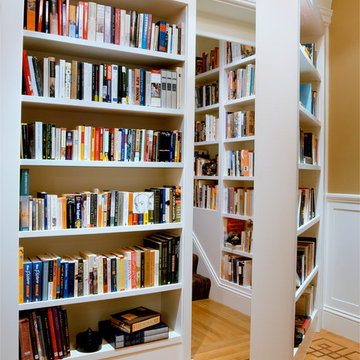 Hidden door in wall bookshelf that leads to upstairs suite