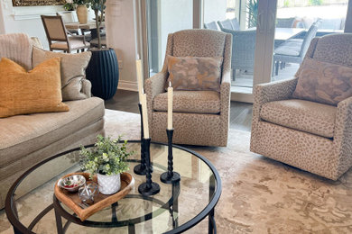 Example of a large transitional open concept dark wood floor, brown floor and coffered ceiling living room design in Austin with white walls, a standard fireplace and a plaster fireplace