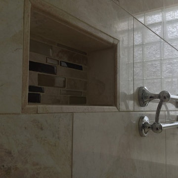 Recessed niche decorative grab bar glass block windows in a roll in handicapped