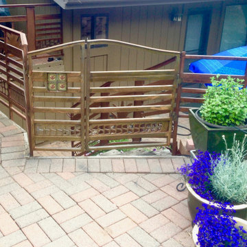 custom double gate with ceramic tiles by Steven Brock