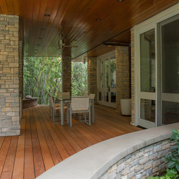 Modern Porch with Outdoor Dining