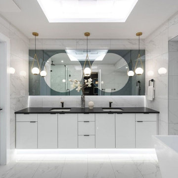 Contemporary bathroom White black and gold accents