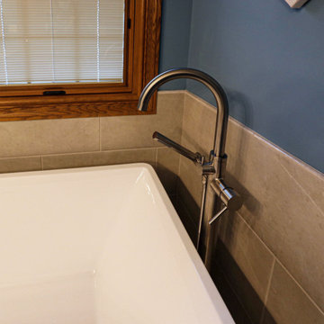 Updated Master Bath with Quartz Countertops, Freestanding Tub & Tiled Shower