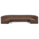 Meridian Furniture - Arc Vegan Leather Upholstered 8-Pc. U-Shaped Modular Sectional, Brown - Unleash modern opulence with the Arc Vegan Leather 8pc. Sectional. Crafted for the modern connoisseur, this Sectional injects an air of refined luxury into any space. Its sleek silhouette, upholstered in supple brown vegan leather, exudes timeless sophistication while the deep channel tufting adds textural intrigue, further elevating the chair's visual appeal. The modular design makes it a versatile chameleon, effortlessly adapting to your evolving needs and preferences. Whether you envision it gracing a chic living room corner, basking in the glow of a bedroom window, or adding a touch of drama to a home office, the Arc seamlessly complements your unique interior aesthetic.