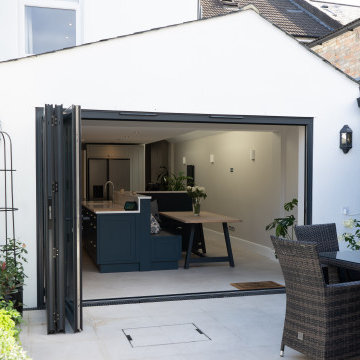 Rear extension with a kitchen island & bench seating