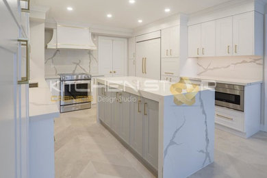Inspiration for a mid-sized transitional u-shaped porcelain tile and gray floor eat-in kitchen remodel in Toronto with an undermount sink, shaker cabinets, white cabinets, quartz countertops, white backsplash, stone slab backsplash, stainless steel appliances and white countertops