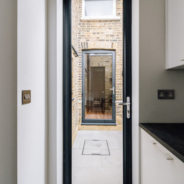 Side and rear extension with a courtyard
