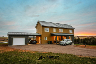 Mid-sized trendy brown two-story wood and clapboard exterior home photo in Other with a metal roof and a gray roof