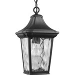 Progress Lighting - Marquette Collection 1-Light Hanging Lantern with DURASHIELD - This hanging lantern is a go-to choice when incorporating classic silhouettes with a farmhouse flair into your home decor vision. The traditional frame is constructed with non-metallic, corrosion-resistant composite polymer in a classic black finish. A beautiful water glass shade adds charming character to the timeless design. DURASHIELD by Progress Lighting is built to last. Constructed from a composite material with UV protection, DURASHIELD holds up even in the harshest weather conditions. This high-performance finish has a 5-year warranty and is resistant to rust, corrosion, and fading.