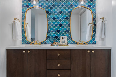 Double shower - large coastal master blue tile and ceramic tile ceramic tile, white floor, double-sink and tray ceiling double shower idea in Tampa with flat-panel cabinets, brown cabinets, white walls, a console sink, granite countertops, a hinged shower door, white countertops, a niche and a floating vanity