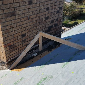 Building a Cricket behind a chimney.