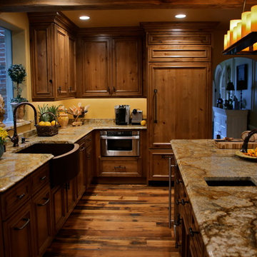Mediterranean Luxury Kitchen Remodel | Stone Accents & Arched Detailing