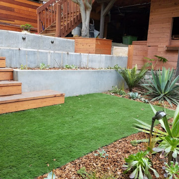 Raised Travertine Patio, Cement Walls with Redwood Appointments
