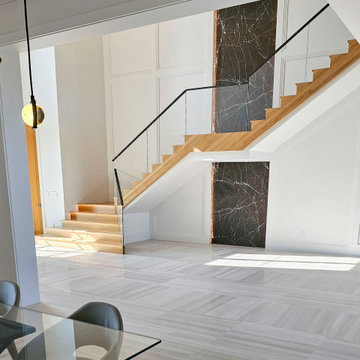Project #107 | Freestanding Staircase with Marble Backdrop
