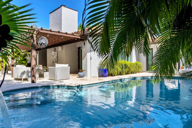Inspiration for a tropical patio remodel in Philadelphia