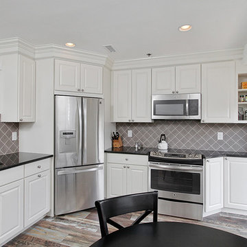 Cherry Hill, NJ: Open Office Kitchen with Diagonal Fridge and Rustic Floors